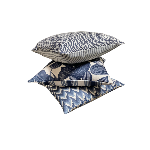 Stack of blue and cream cushions - prints