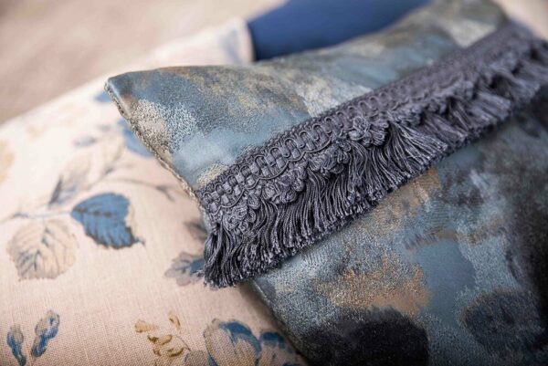 Opulence is a stunning embroidered cushion featuring French Fringe